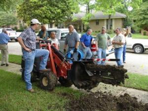 our Weston sprinkler repair specialists are using a trencher for new system installations